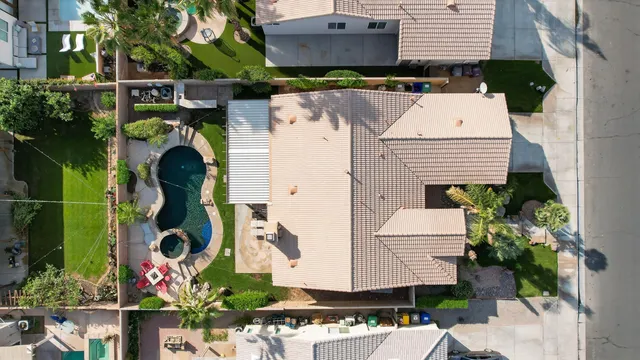 an aerial view of multiple houses with outdoor space