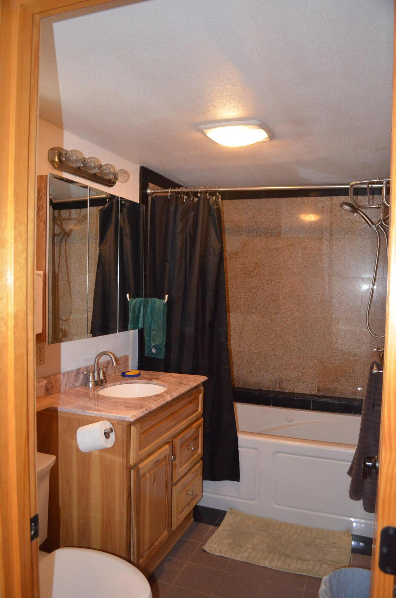 132860 Highway 97 Crescent, OR 97733 - Photo 12 of 25 a bathroom with a sink and a mirror