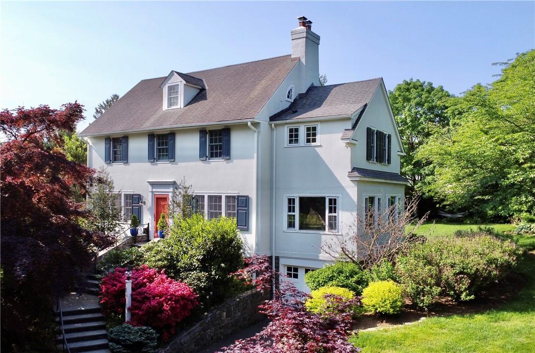 A pretty pretty house on a hill just a few blocks from Murray Avenue Elementary School.