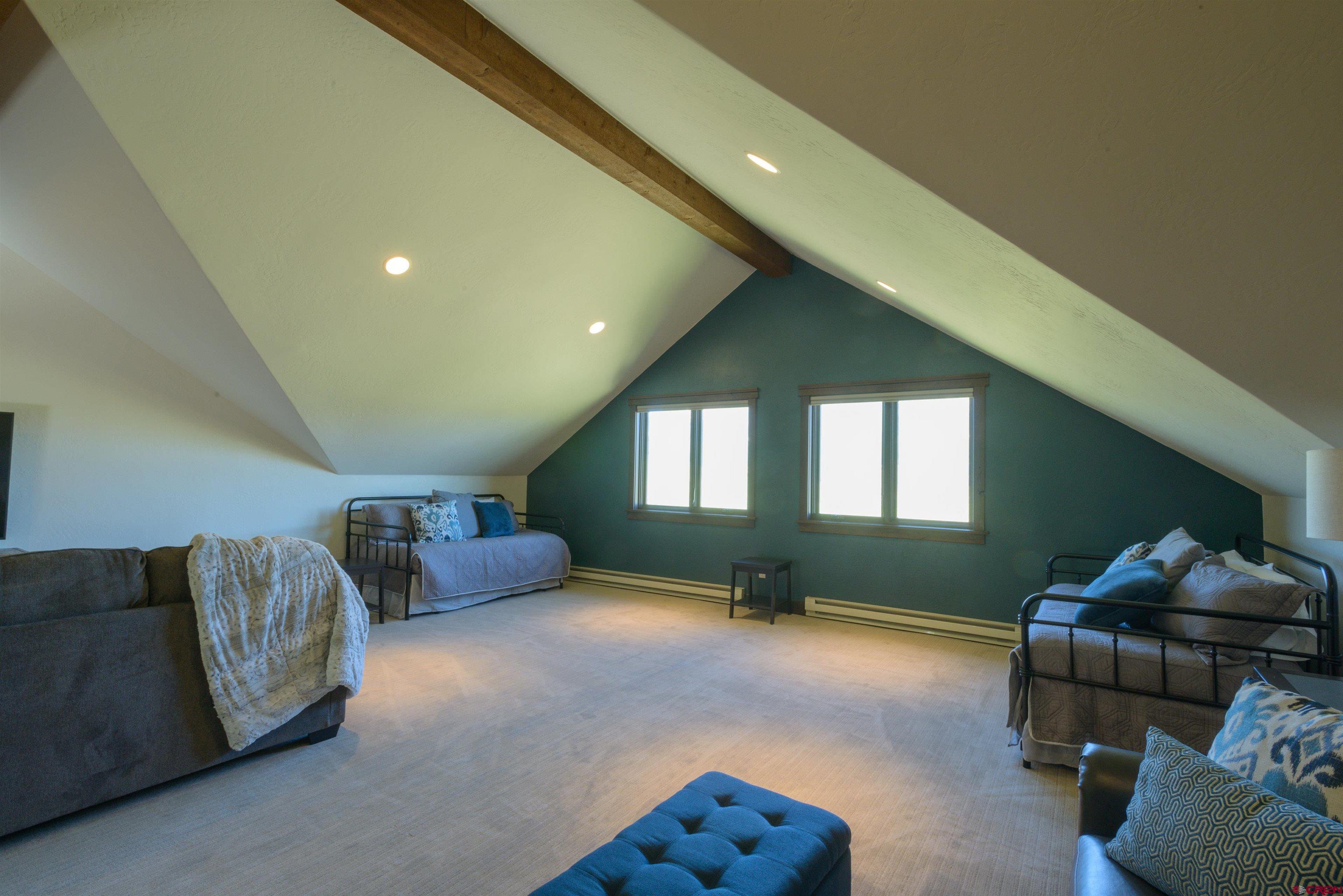 660 Lower Highlands Road Crested Butte, CO 81224 - Photo 24 of 31 a living room with furniture and a window