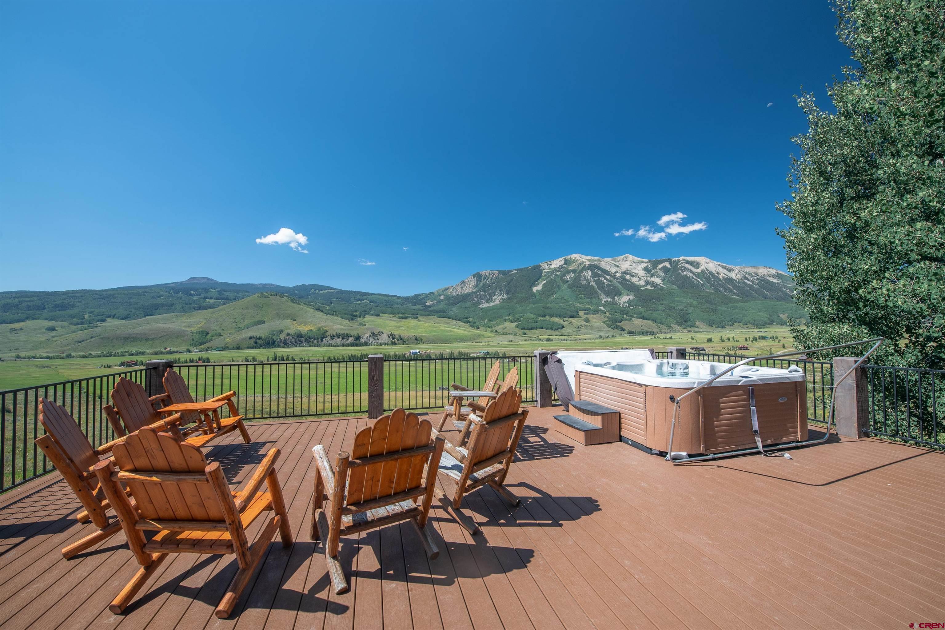 660 Lower Highlands Road Crested Butte, CO 81224 - Photo 3 of 31 a view of a terrace with furniture and outdoor space