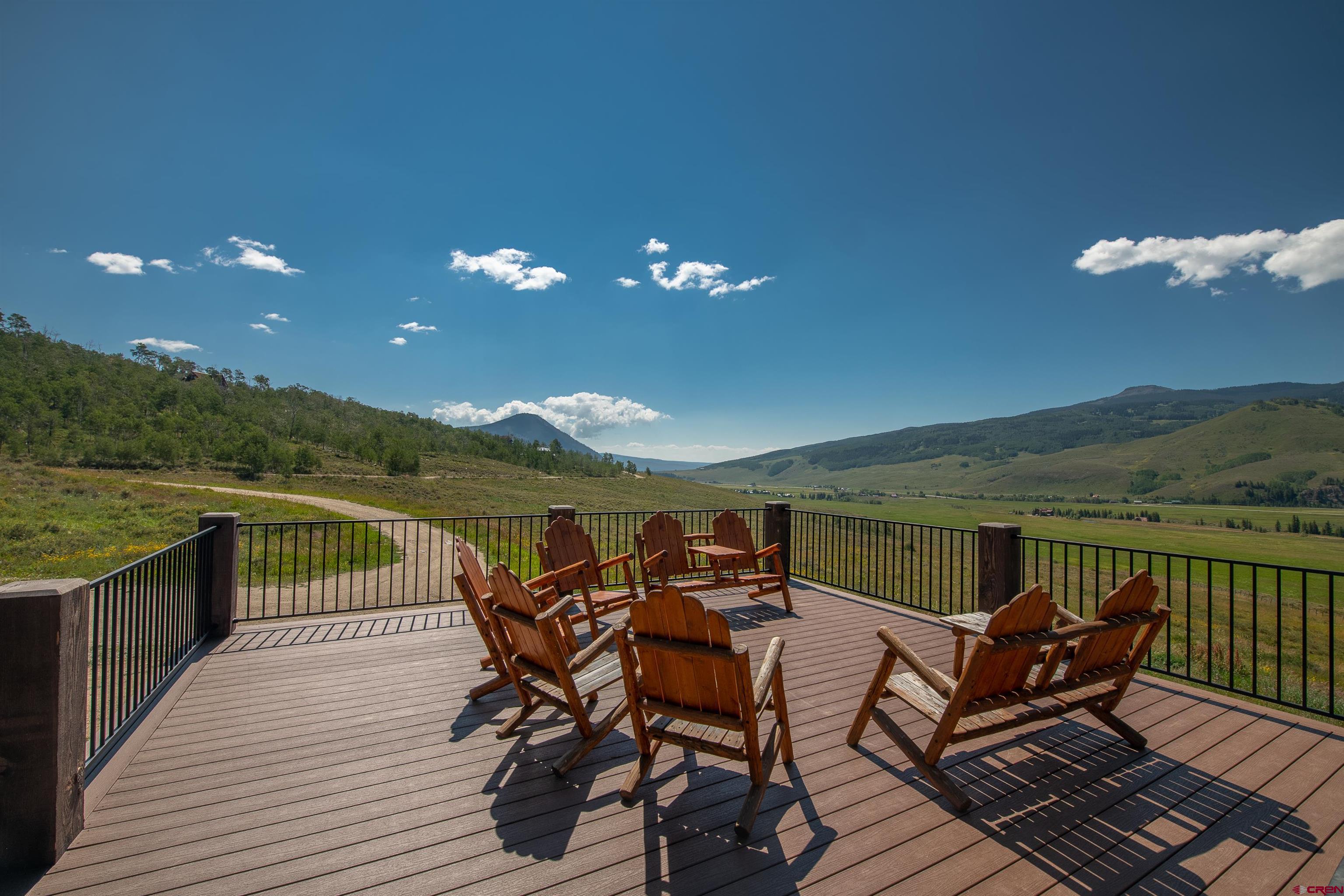660 Lower Highlands Road Crested Butte, CO 81224 - Photo 4 of 31 a view of a terrace with furniture