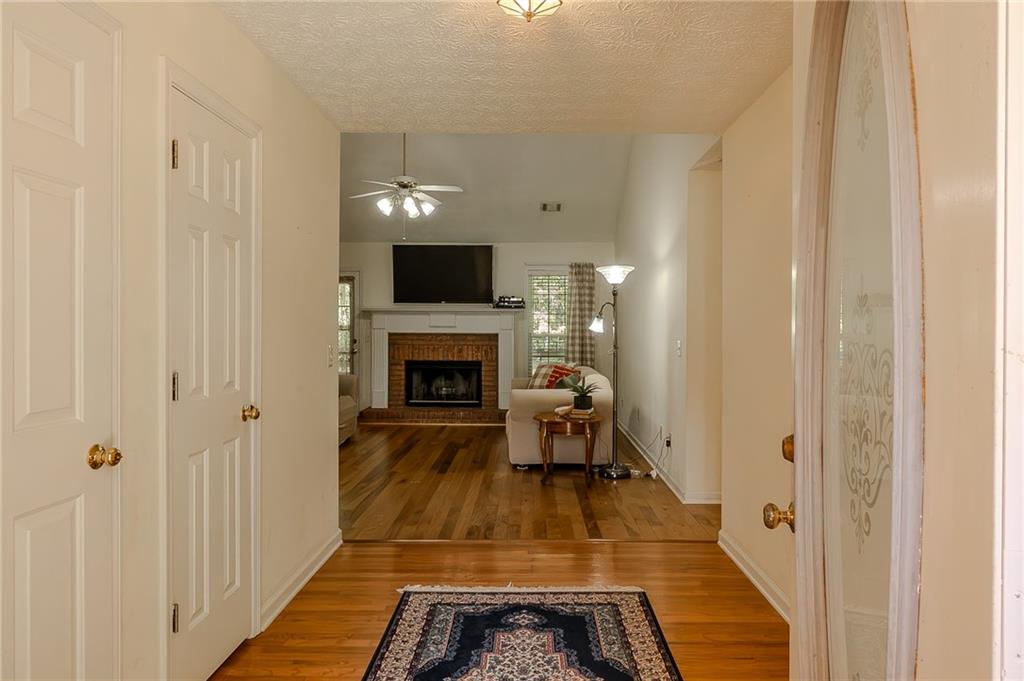 160 Vinny's Way Covington, GA 30014 - Photo 2 of 51 a living room with furniture and a fireplace