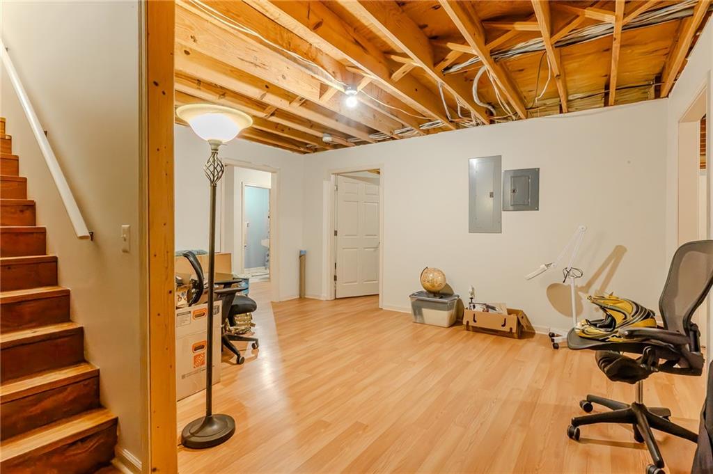 160 Vinny's Way Covington, GA 30014 - Photo 26 of 51 a room with gym equipment and wooden floor