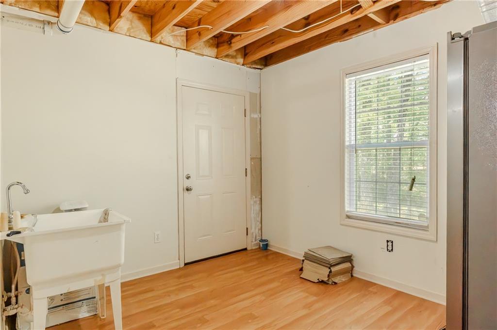 160 Vinny's Way Covington, GA 30014 - Photo 31 of 51 a view of a room with wooden floor and bedroom