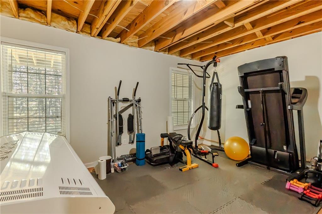 160 Vinny's Way Covington, GA 30014 - Photo 32 of 51 a view of a room with gym equipment