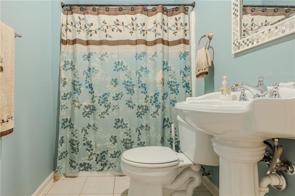 160 Vinny's Way Covington, GA 30014 - Photo 33 of 51 a bathroom with a sink and a toilet