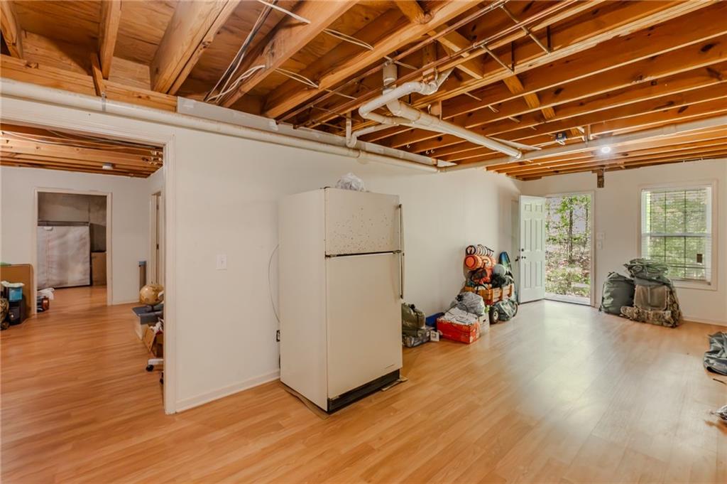 160 Vinny's Way Covington, GA 30014 - Photo 35 of 51 a view of a room with gym equipment and a view of living room