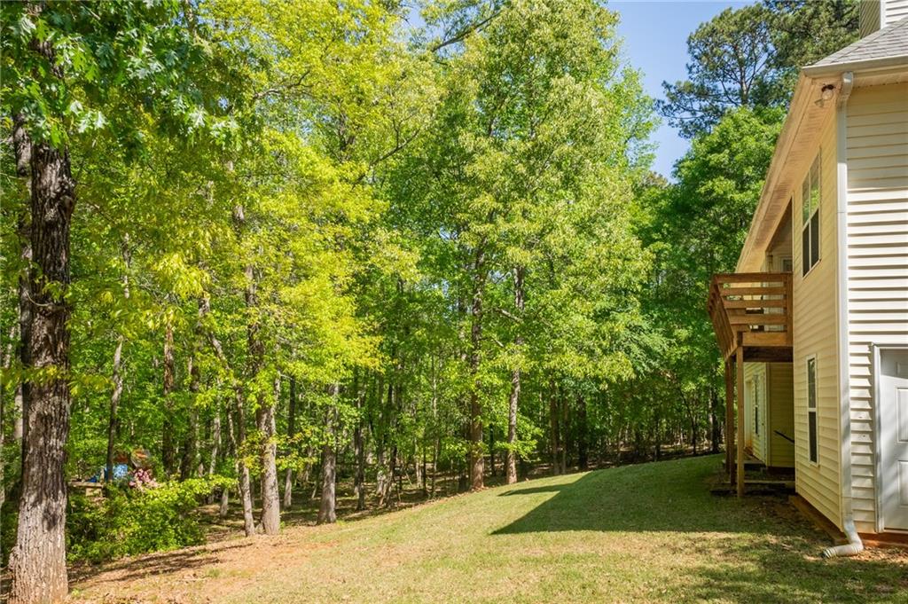 160 Vinny's Way Covington, GA 30014 - Photo 41 of 51 a view of a yard with a house
