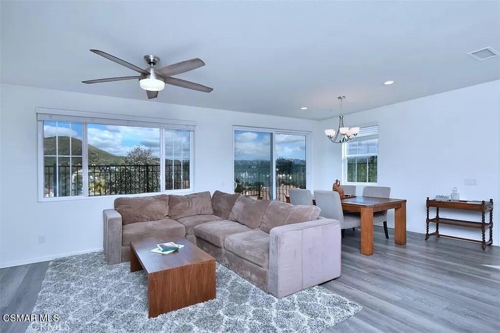 207 Morro Way, Unit 3 Simi Valley, CA 93065 - Photo 3 of 31 a living room with furniture and a large window