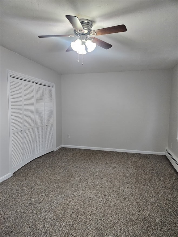 33 Rockland Street, Unit 2 Canton, MA 02021 - Photo 8 of 10 an empty room with a ceiling fan and a window