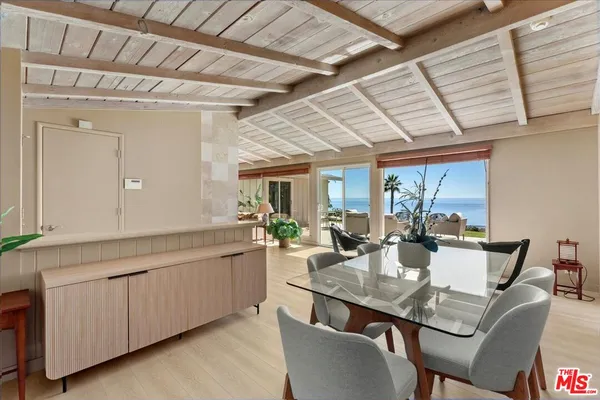 a view of an ocean yard and outdoor seating