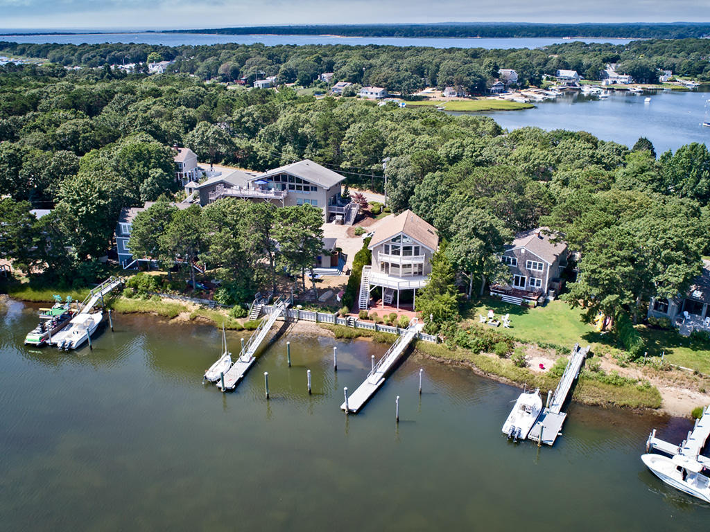 6 Great River Road Mashpee, MA 02649 - Photo 8 of 21 an aerial view of a house with a yard swimming pool and outdoor seating