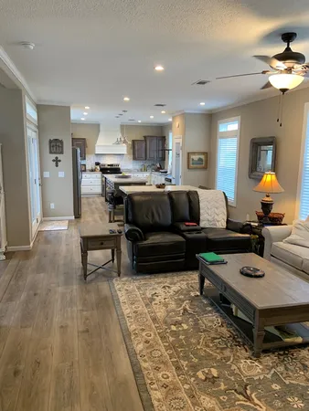 a living room with furniture and a table