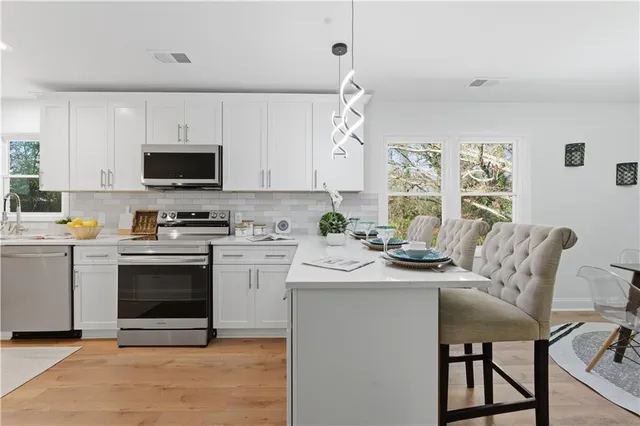 a view of a backyard of a house