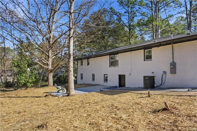 a view of a backyard with a barn