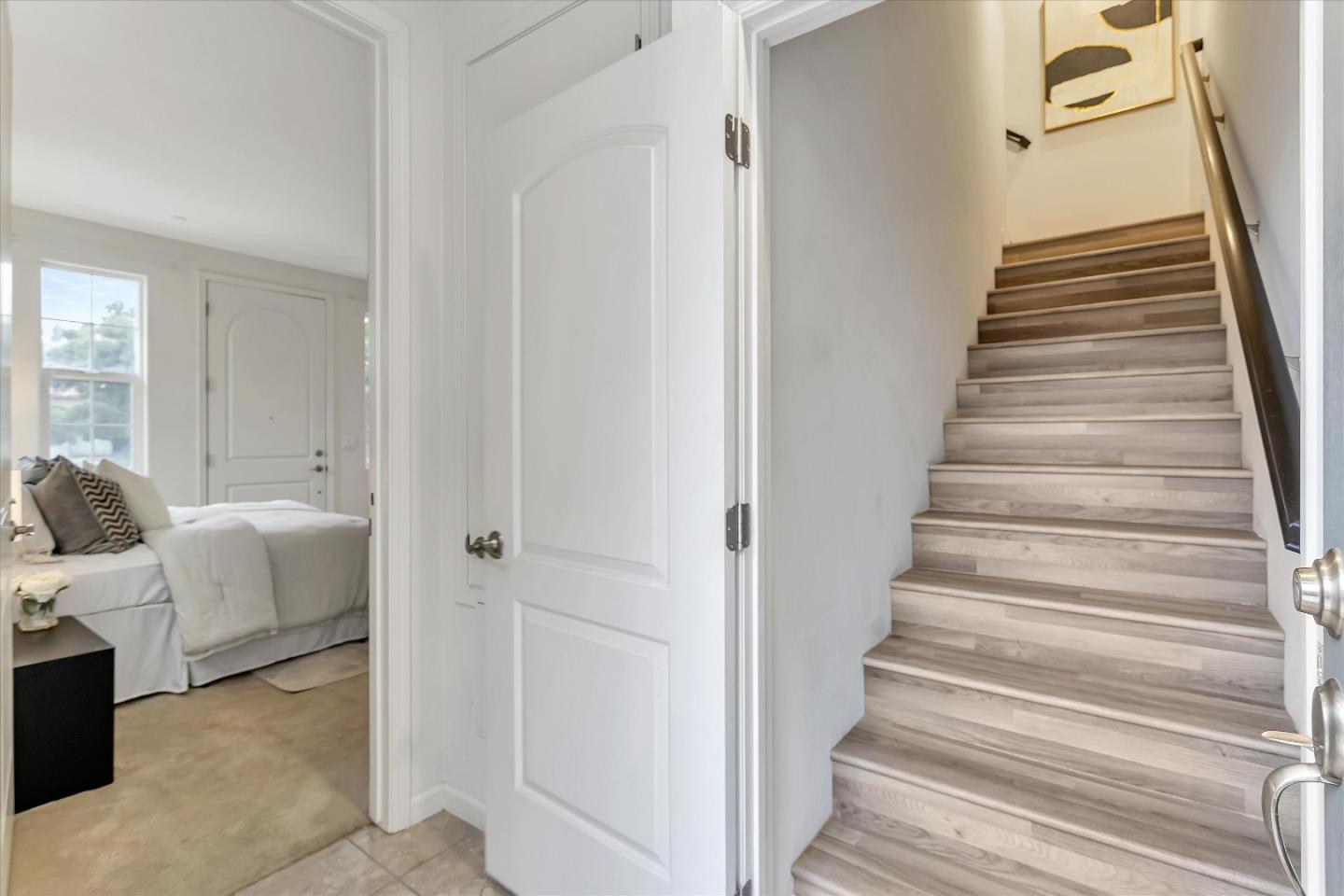 5814 Riley Way Newark, CA 94560 - Photo 16 of 46 a view of entryway and hall with wooden floor