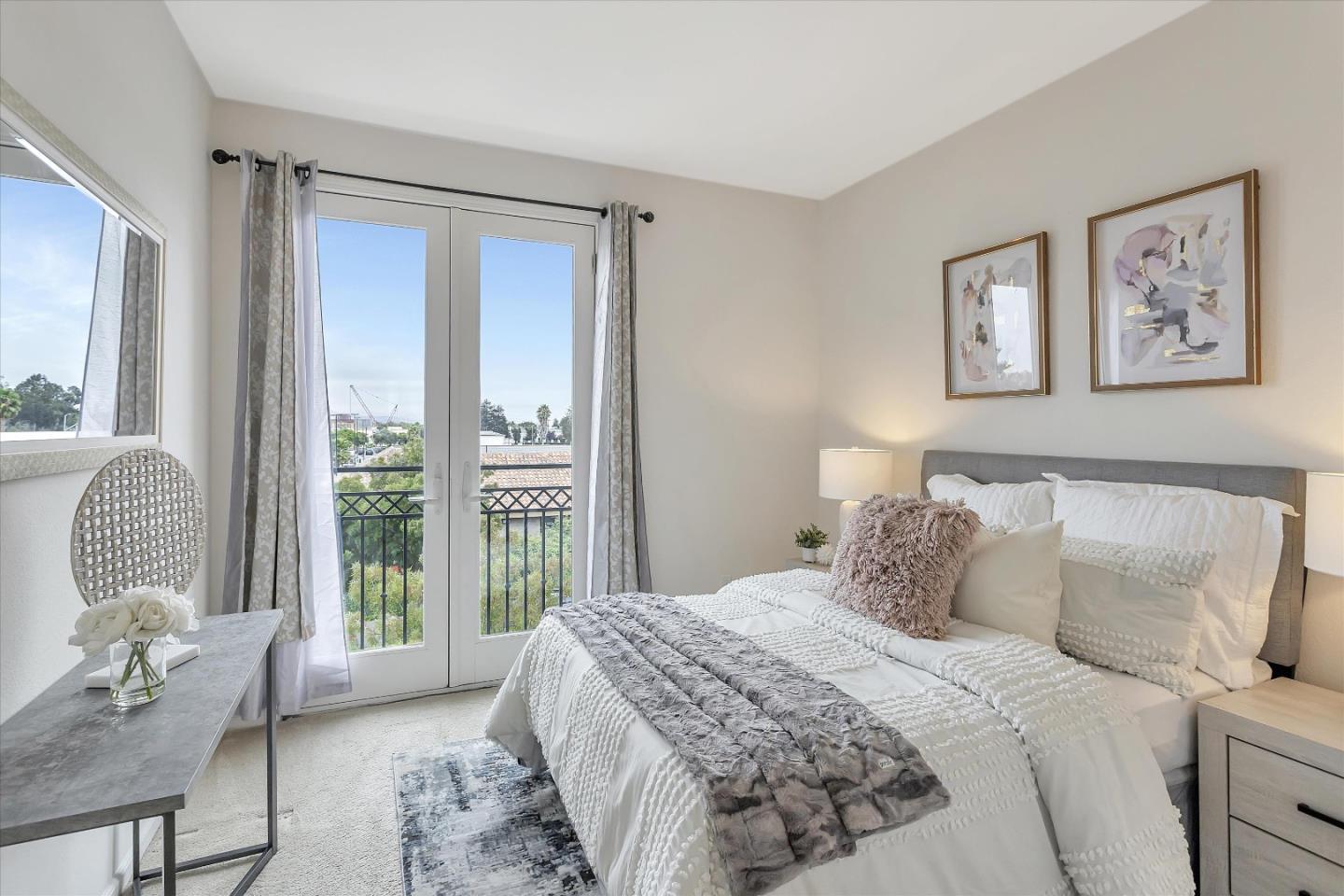 5814 Riley Way Newark, CA 94560 - Photo 17 of 46 a bedroom with a large bed and glass window