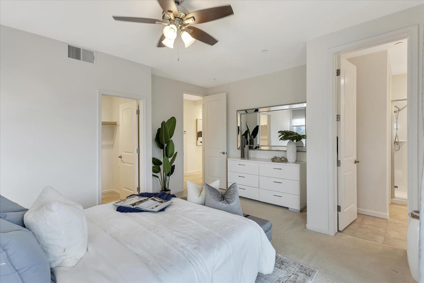 5814 Riley Way Newark, CA 94560 - Photo 20 of 46 a bedroom with a bed and cabinets