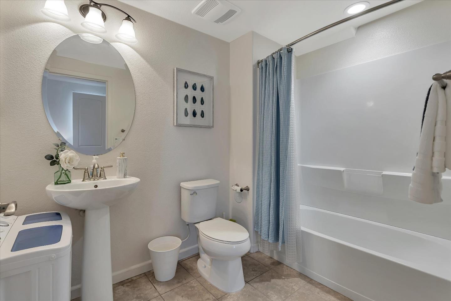 5814 Riley Way Newark, CA 94560 - Photo 25 of 46 a bathroom with a toilet sink and shower