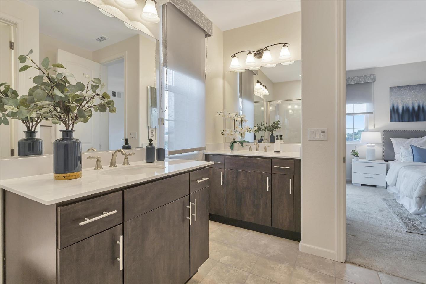 5814 Riley Way Newark, CA 94560 - Photo 29 of 46 a en suite bathroom with a sink and a mirror