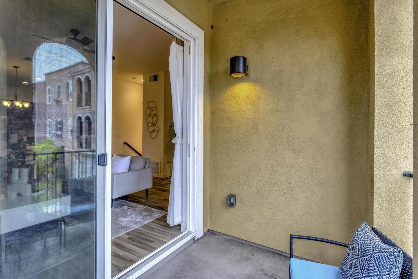 5814 Riley Way Newark, CA 94560 - Photo 37 of 46 a view of a hallway with wooden floor and a bathroom