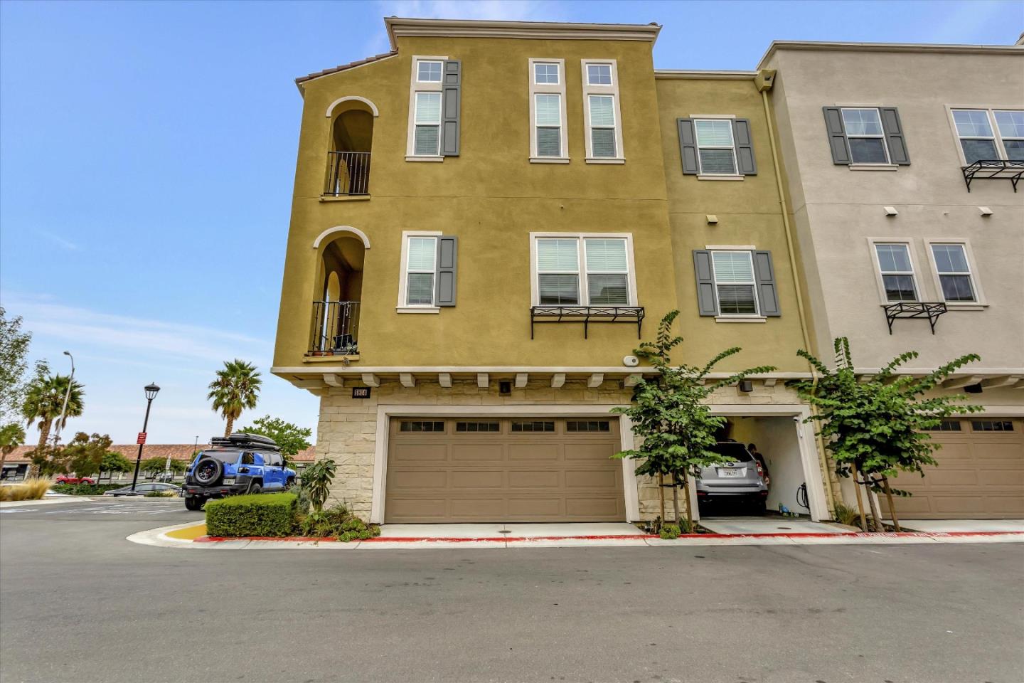 5814 Riley Way Newark, CA 94560 - Photo 41 of 46 a front view of a house with a yard and garage