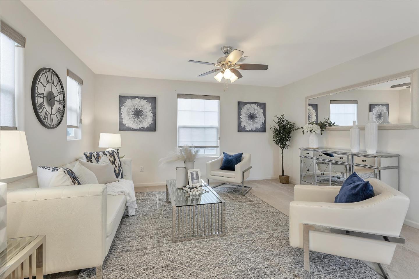 5814 Riley Way Newark, CA 94560 - Photo 6 of 46 a living room with furniture a clock on wall and a window