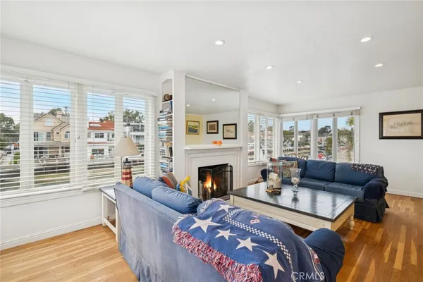 a bedroom with a large bed and a large window