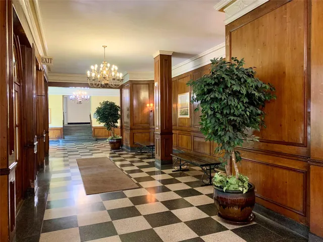 a view of a entryway with flower pots