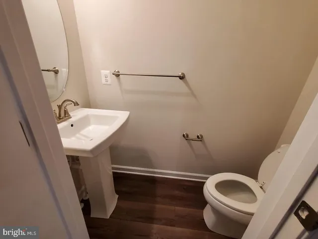 a bathroom with a sink and toilet