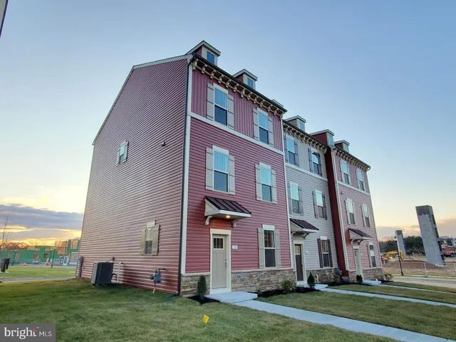 a view of a building with a yard