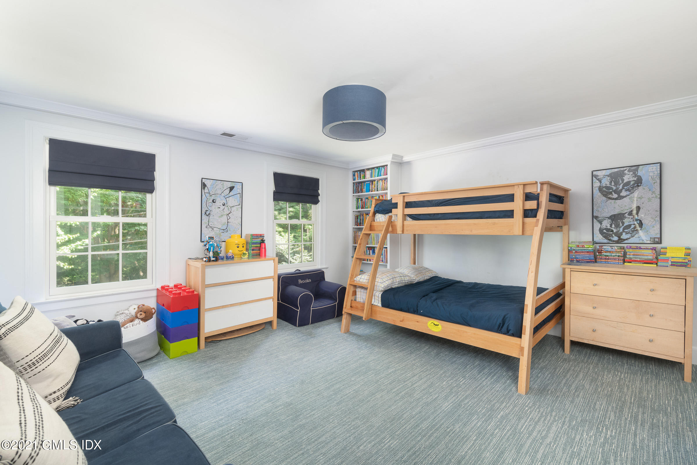 6 Park Avenue Greenwich, CT 06830 - Photo 11 of 24 a bedroom with furniture and a window