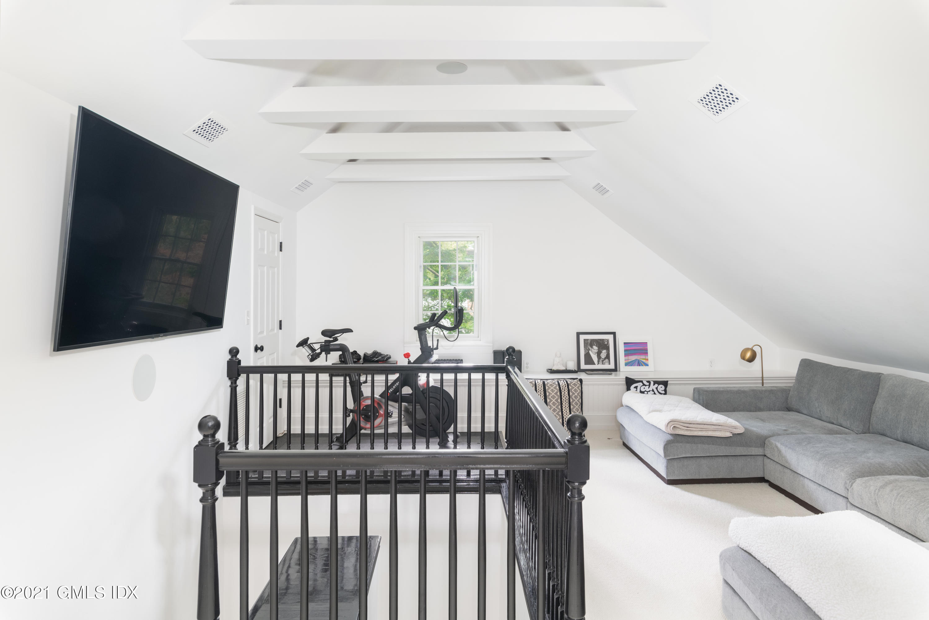 6 Park Avenue Greenwich, CT 06830 - Photo 14 of 24 a living room with furniture and a flat screen tv