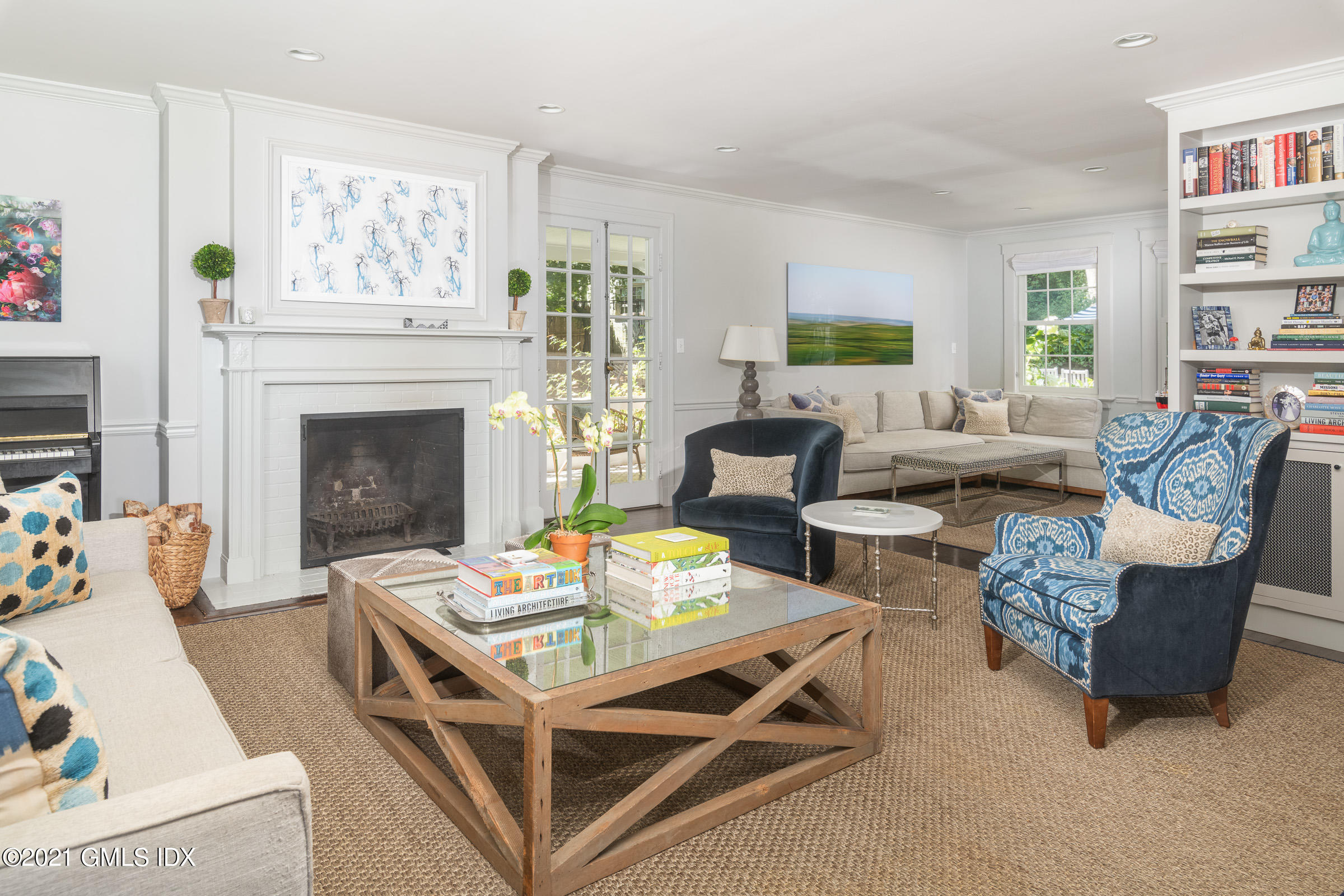 6 Park Avenue Greenwich, CT 06830 - Photo 3 of 24 a living room with furniture and a fireplace
