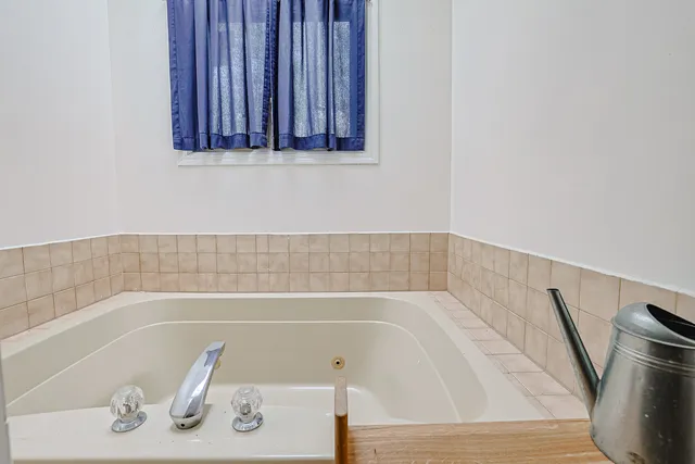 a bathroom with bathtub