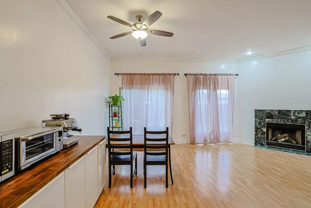 a view of a livingroom with furniture and a kitchen
