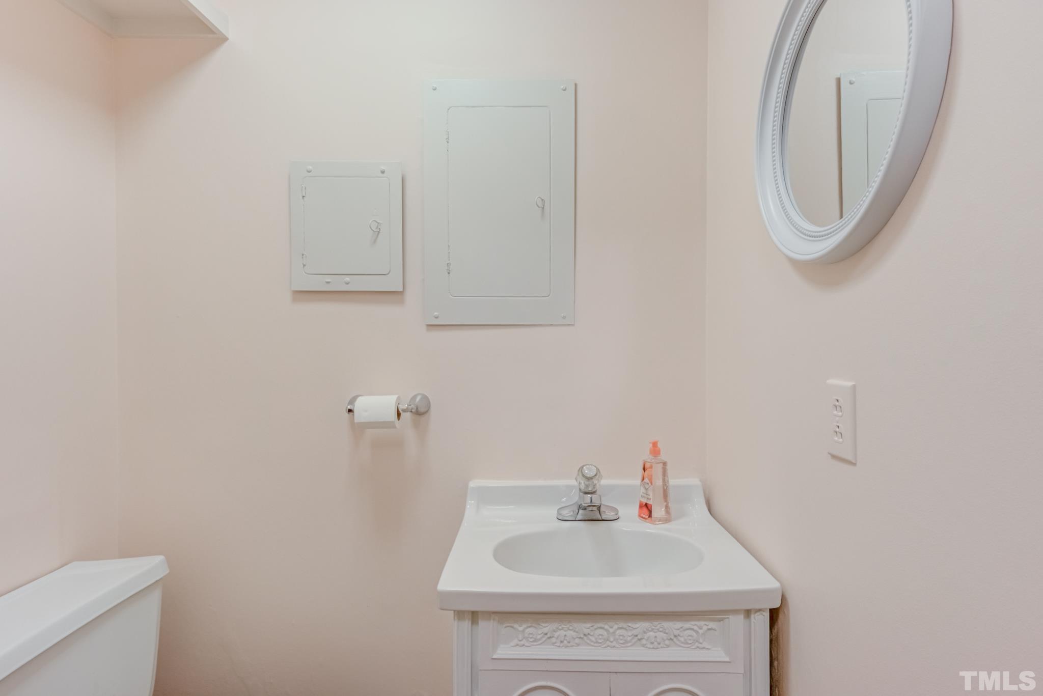 3213 Julian Drive Raleigh, NC 27604 - Photo 28 of 54 a bathroom with a sink and a toilet