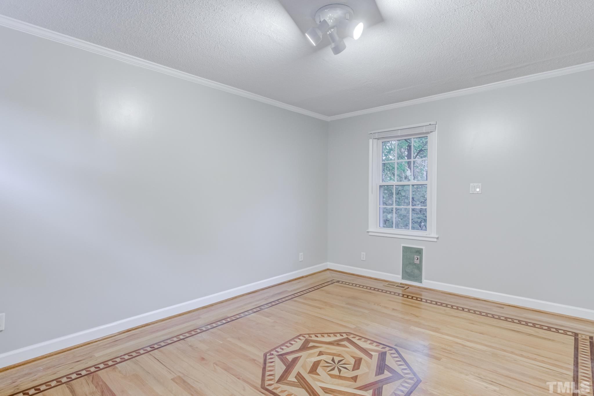 3213 Julian Drive Raleigh, NC 27604 - Photo 29 of 54 an empty room with windows