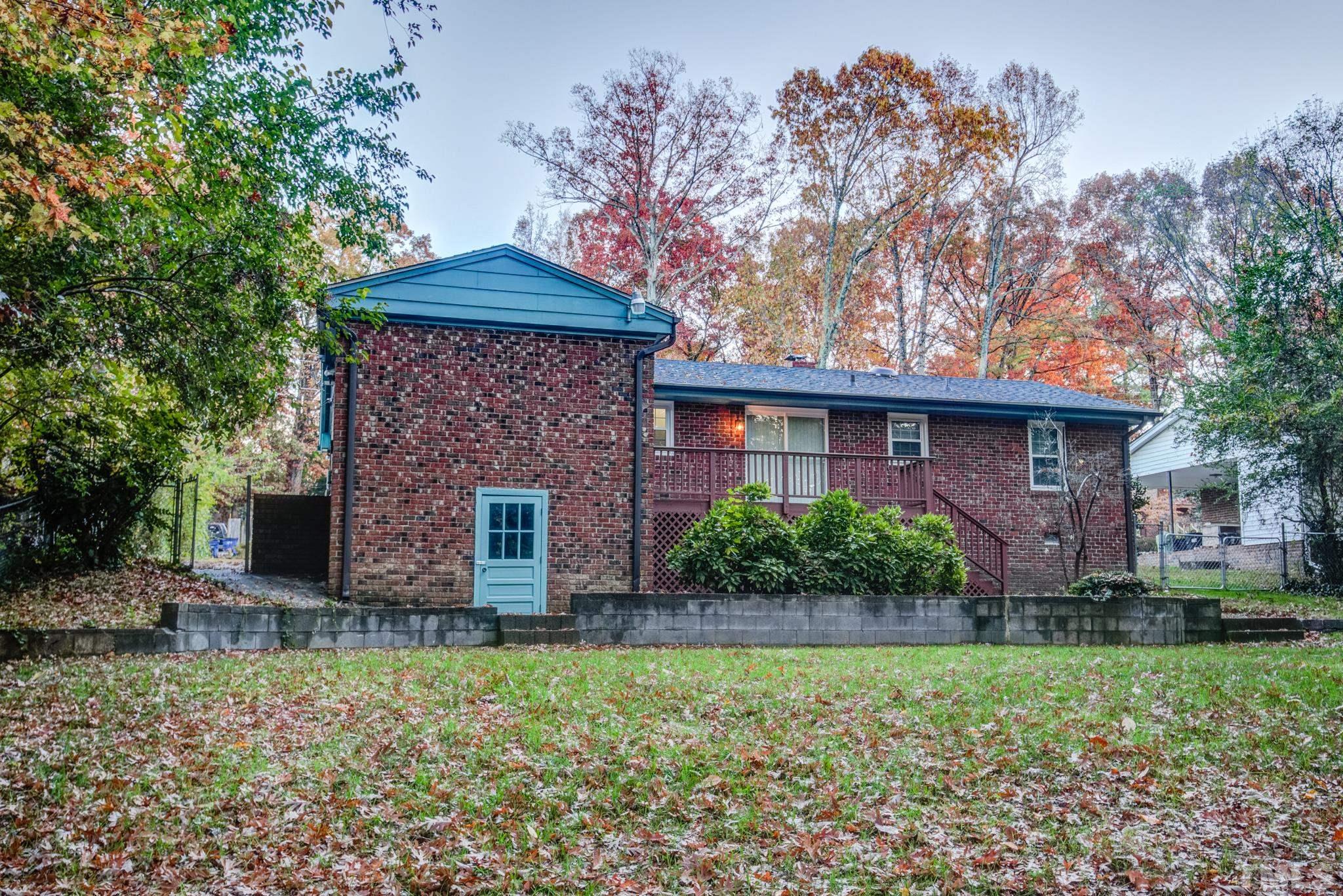 3213 Julian Drive Raleigh, NC 27604 - Photo 44 of 54 a front view of a house with garden