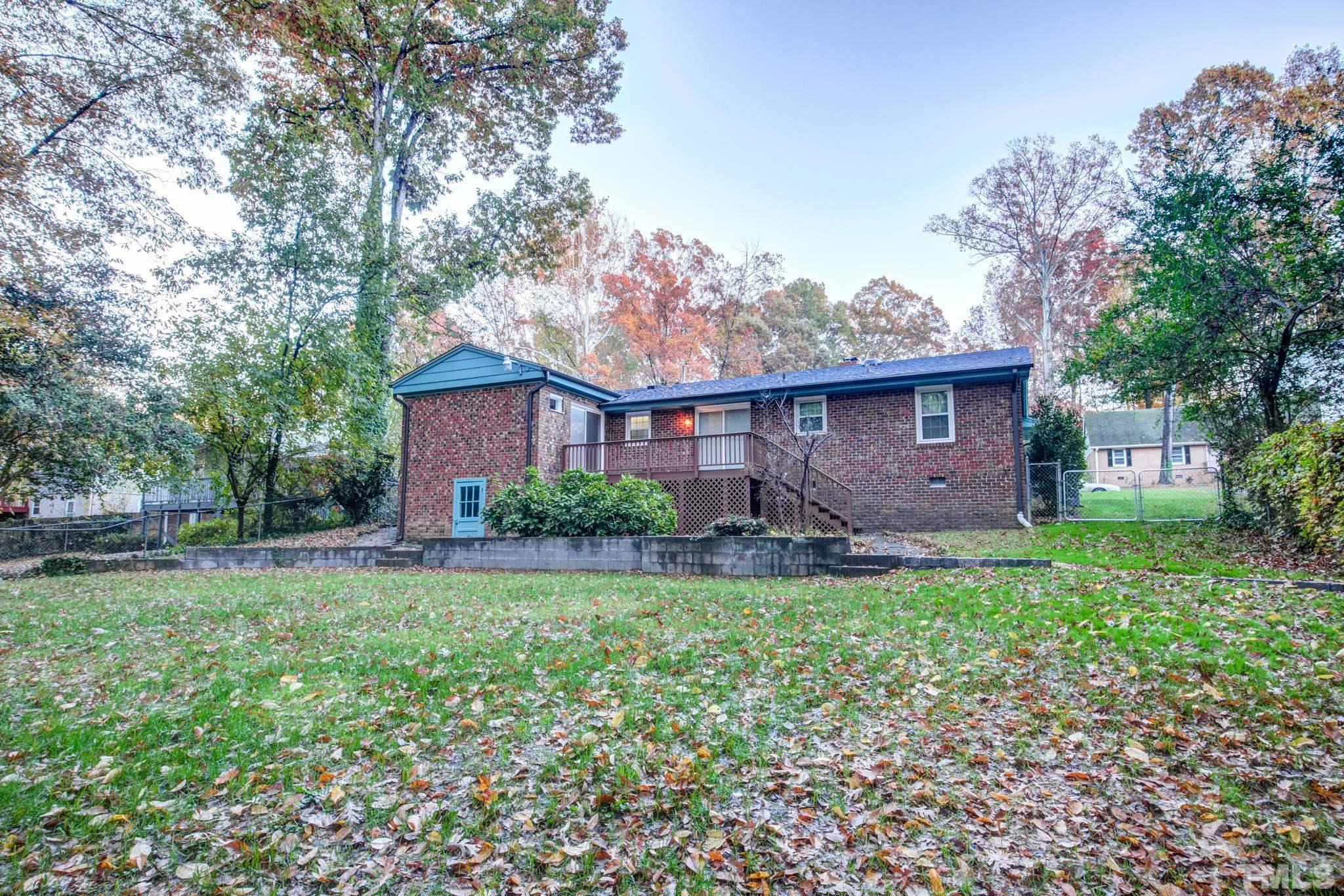3213 Julian Drive Raleigh, NC 27604 - Photo 47 of 54 a view of a house with backyard and garden