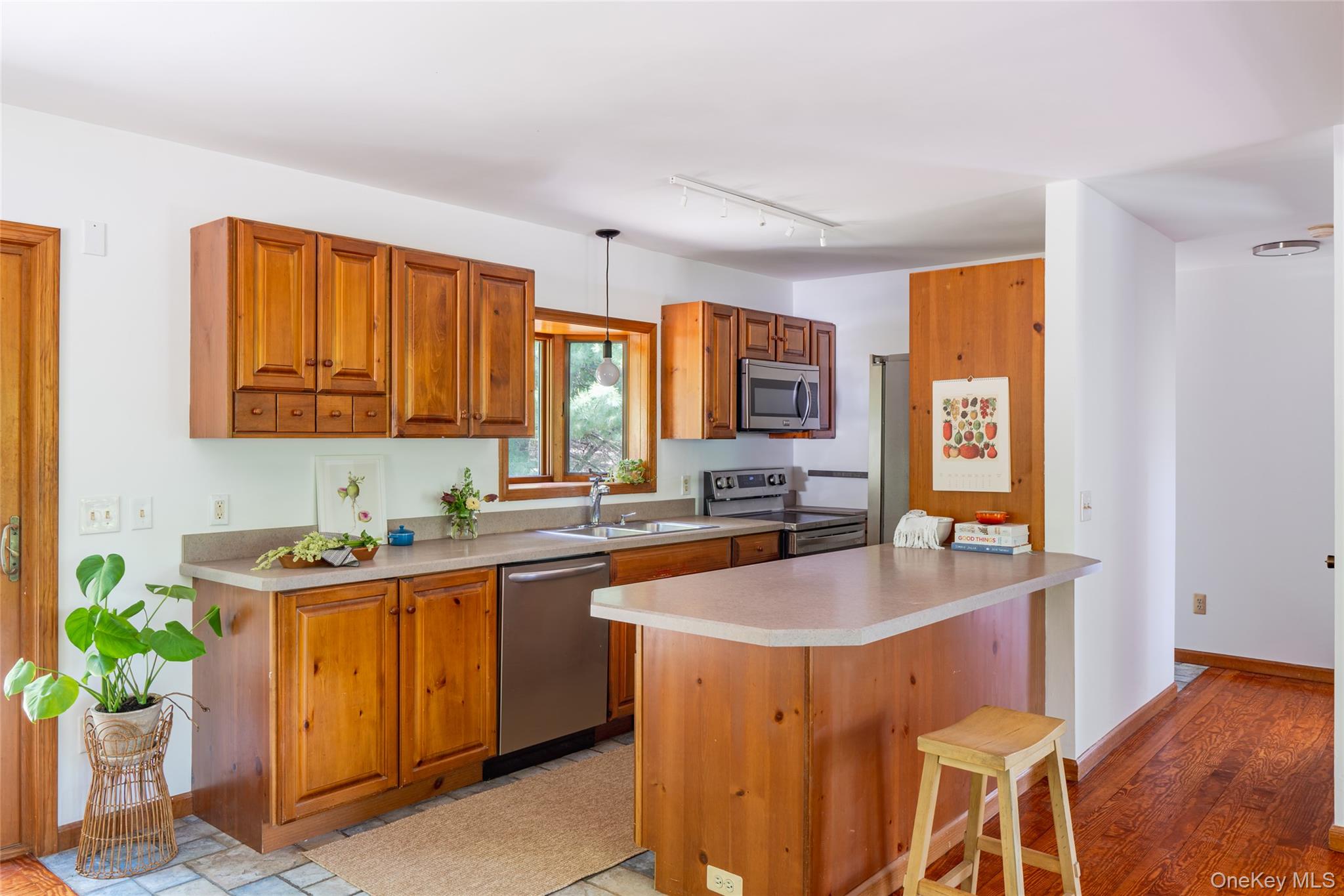 182 Frey Road Pine Bush, NY 12566 - Photo 7 of 33 a kitchen with a sink stove and cabinets