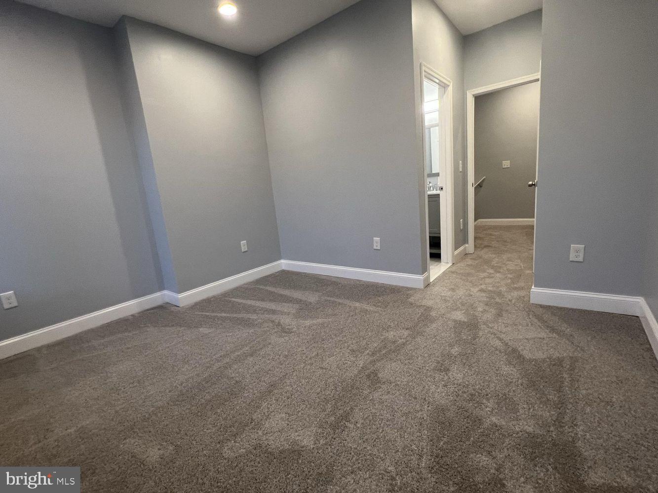 1607 East Biddle Street Baltimore, MD 21213 - Photo 19 of 23 an empty room with an entryway
