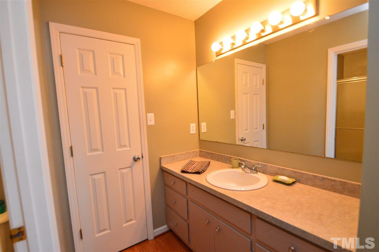 6801 Kiger Road Rougemont, NC 27572 - Photo 15 of 25 a bathroom with a sink and a mirror