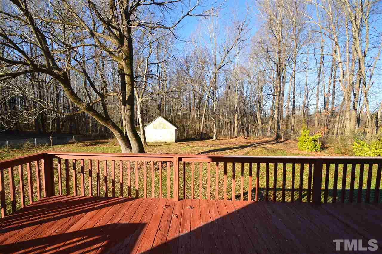 6801 Kiger Road Rougemont, NC 27572 - Photo 21 of 25 a view of a wooden roof deck