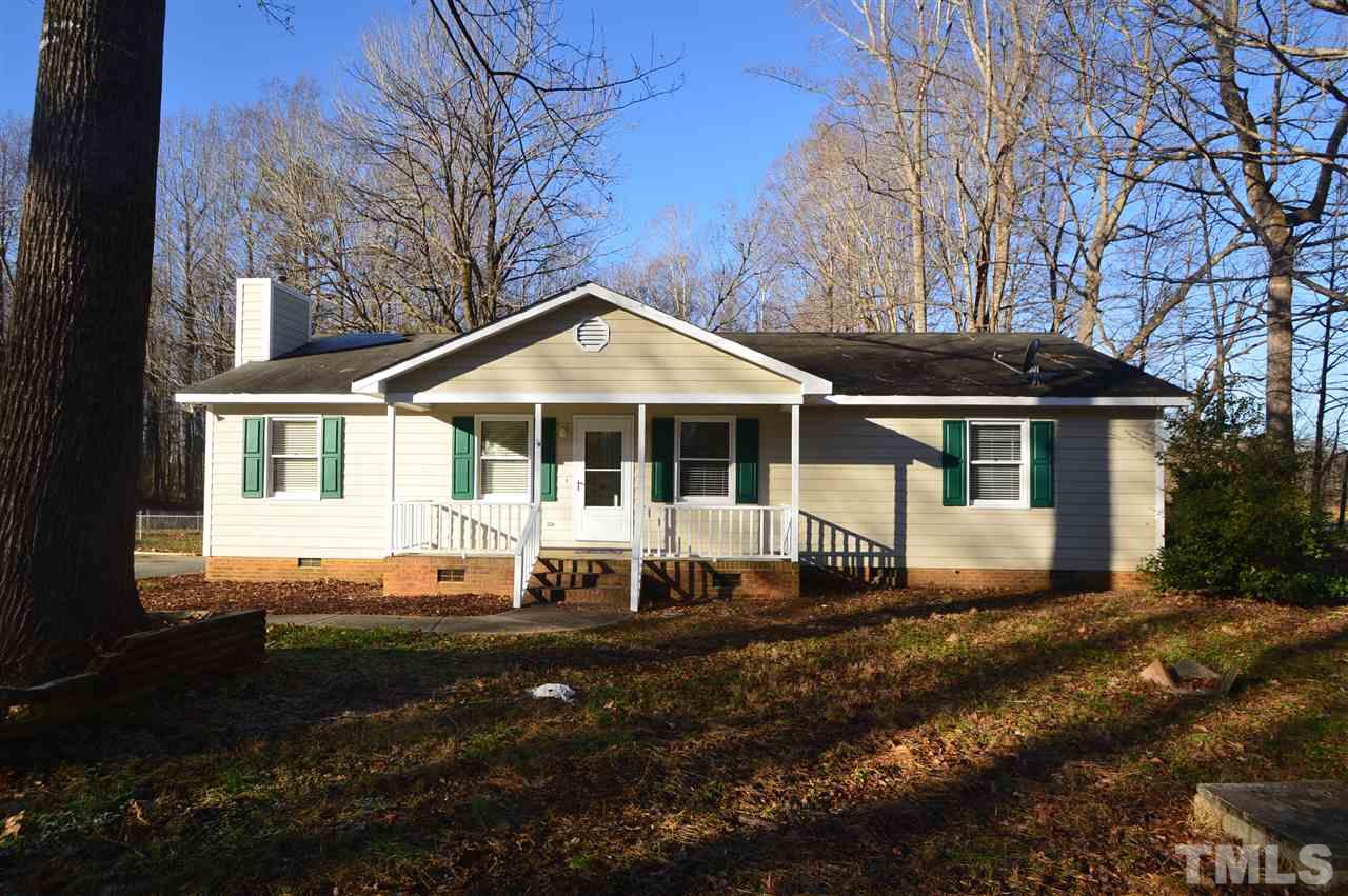 6801 Kiger Road Rougemont, NC 27572 - Photo 25 of 25 a front view of a house with a yard