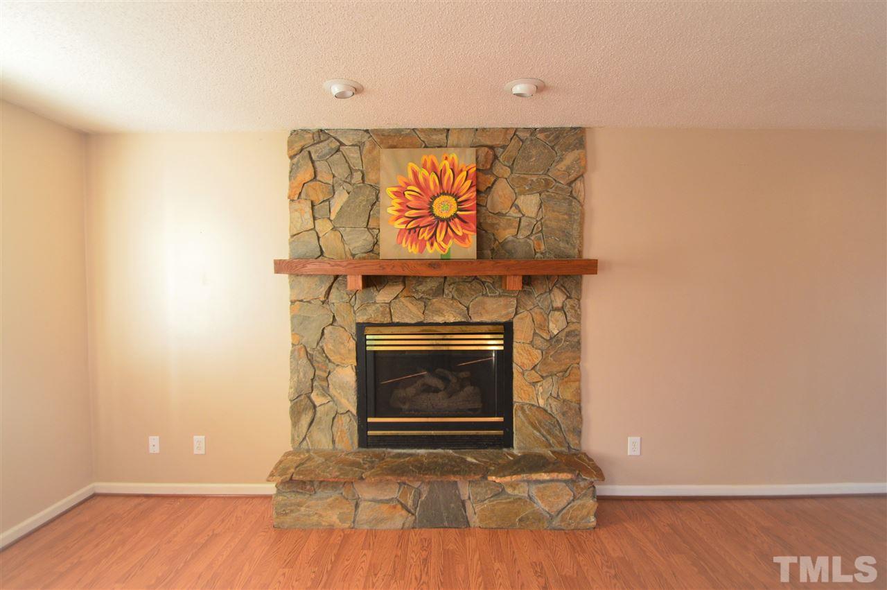 6801 Kiger Road Rougemont, NC 27572 - Photo 5 of 25 a living room with a fireplace