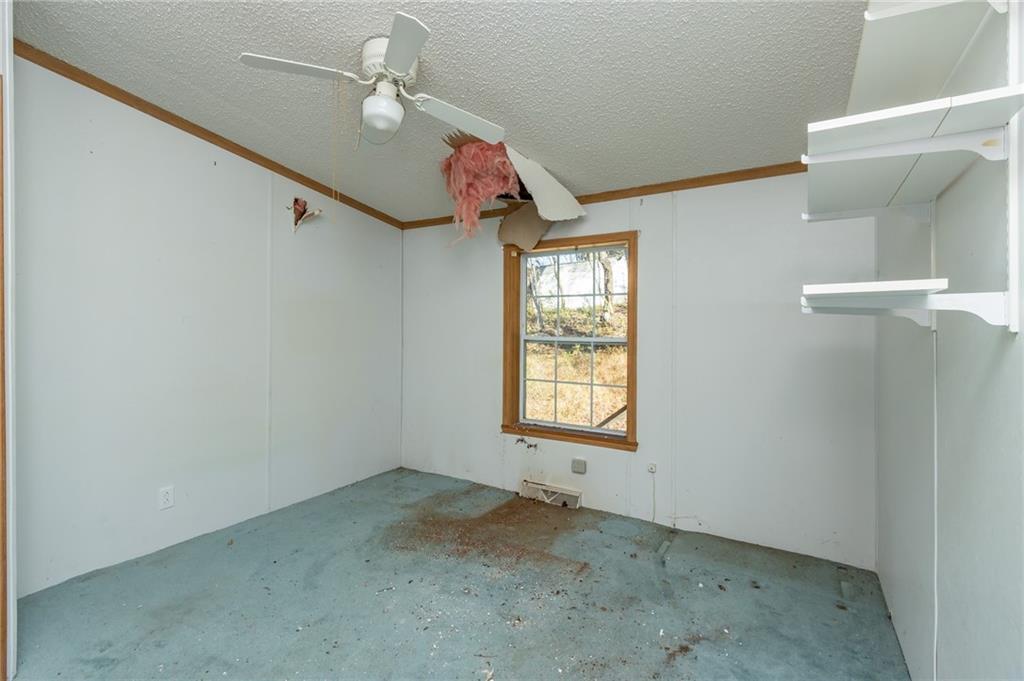 145 Shelby Lane Apollo, PA 15613 - Photo 14 of 21 an empty room with windows and cabinet