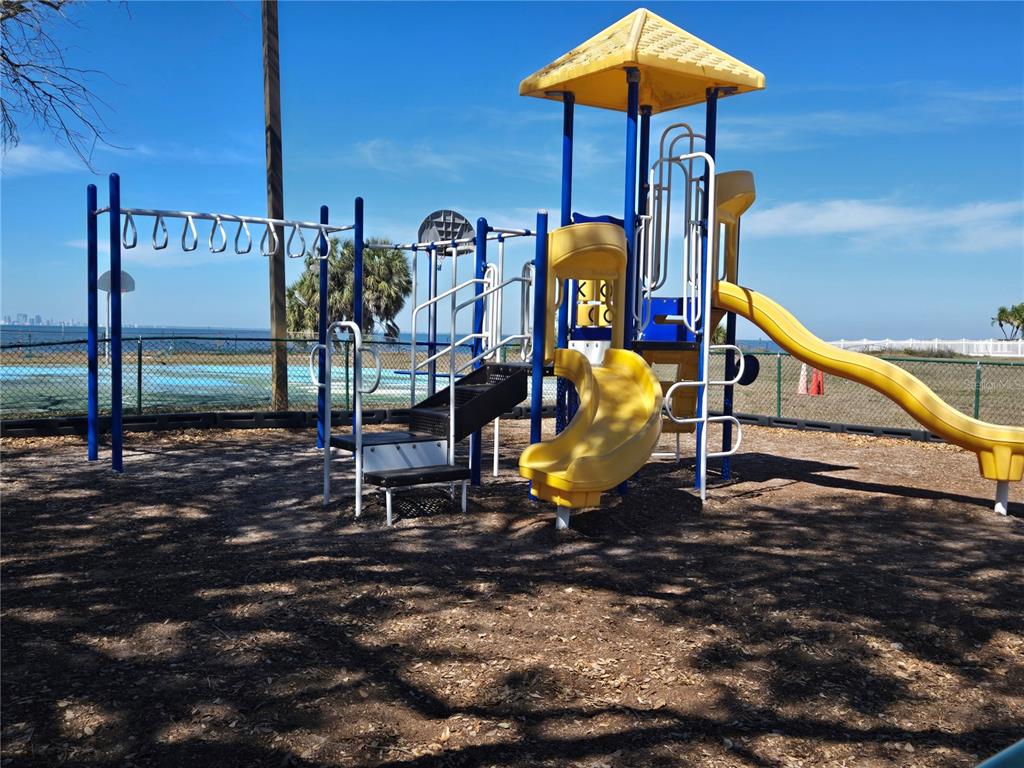 611 Destiny Drive, Unit 101 Ruskin, FL 33570 - Photo 15 of 20 a view of a park with slide