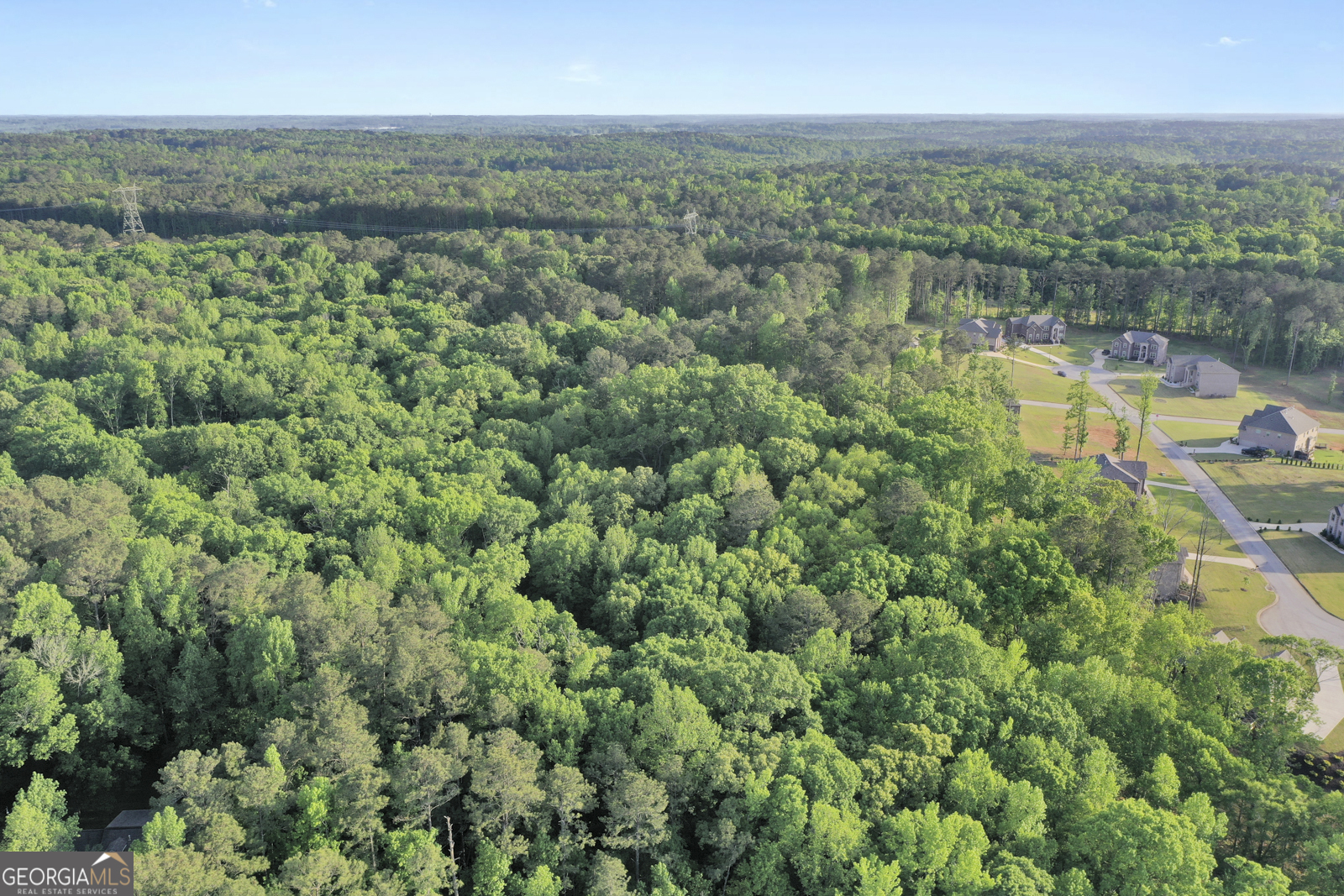 0 Shannon Trail Southwest Conyers, GA 30094 - Photo 1 of 1 an aerial view of residential houses with outdoor space and trees